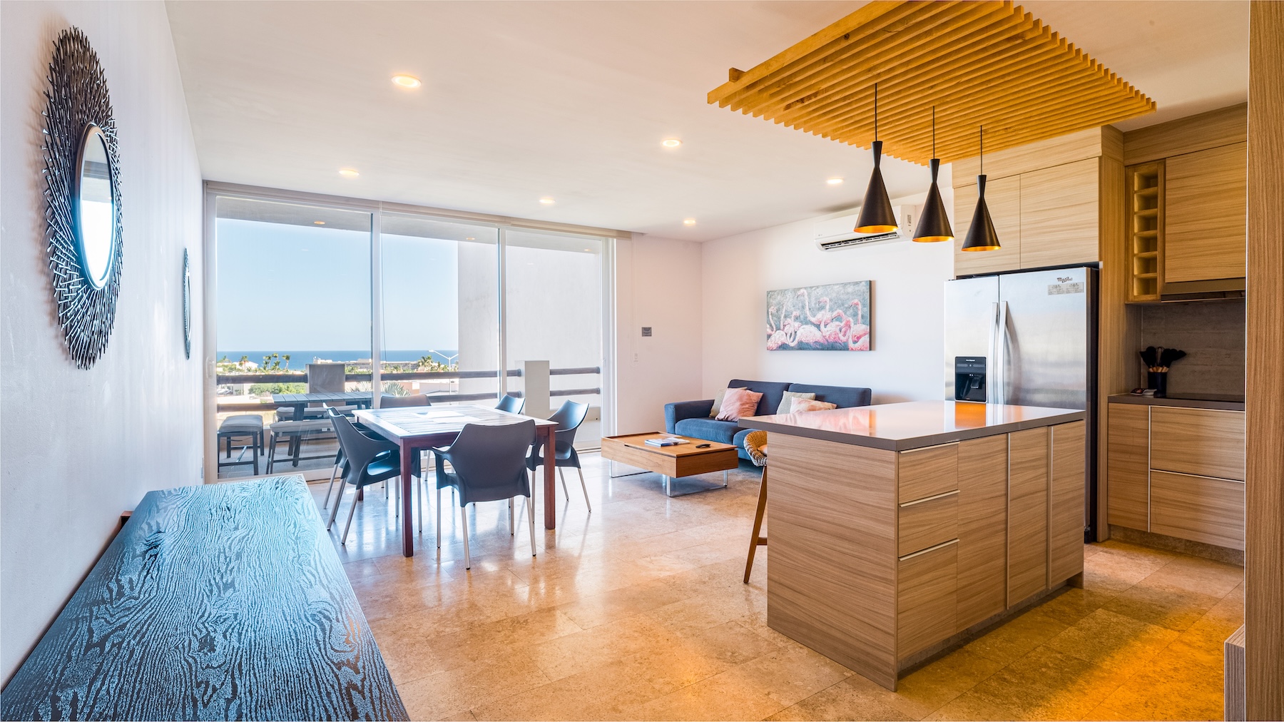 Open-concept kitchen and dining area with natural light