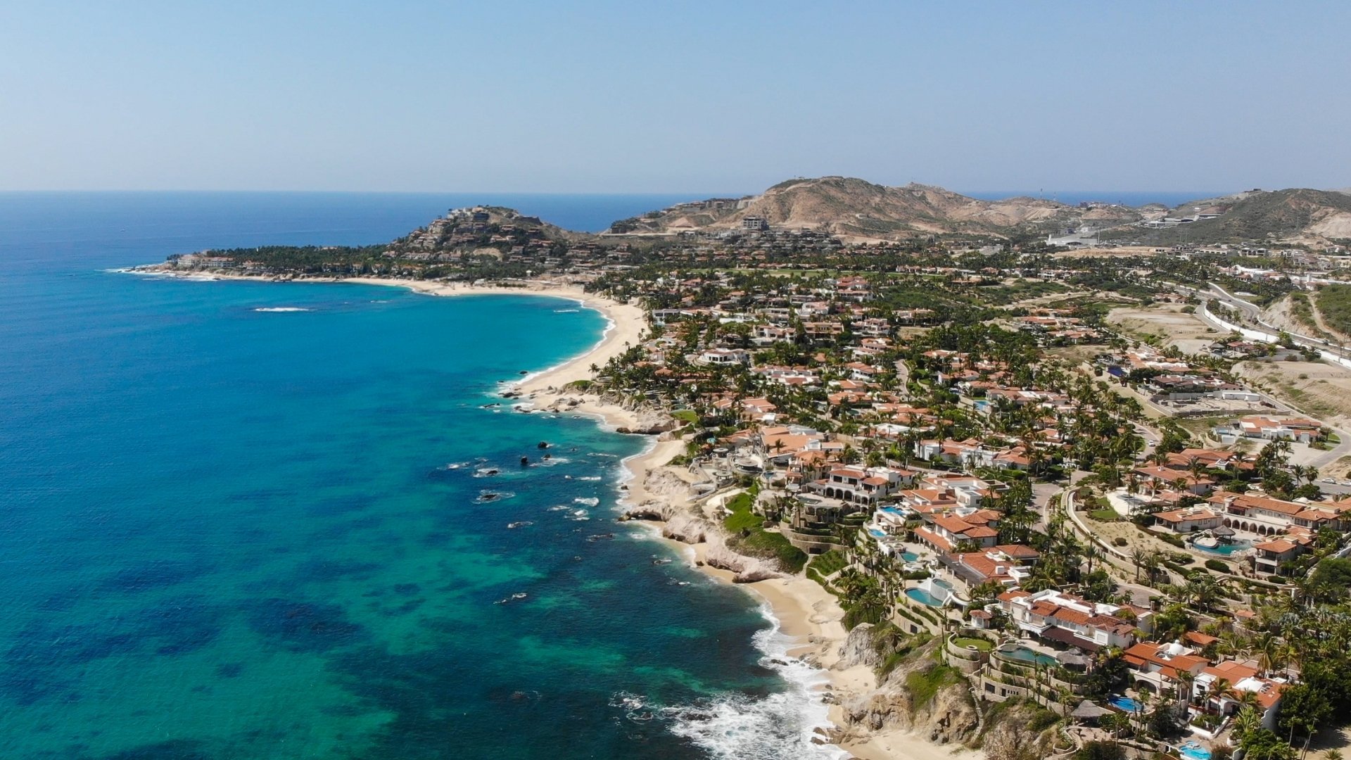 Modern oceanfront residences at Chileno Bay, San José del Cabo, showcasing contemporary luxury design